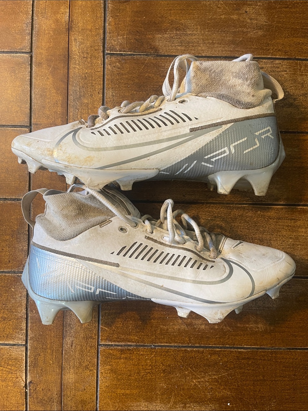 Nike Men’s White and Gray Mid-Cut Football Cleats